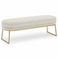 Banc en tissu beige avec pieds en métal doré